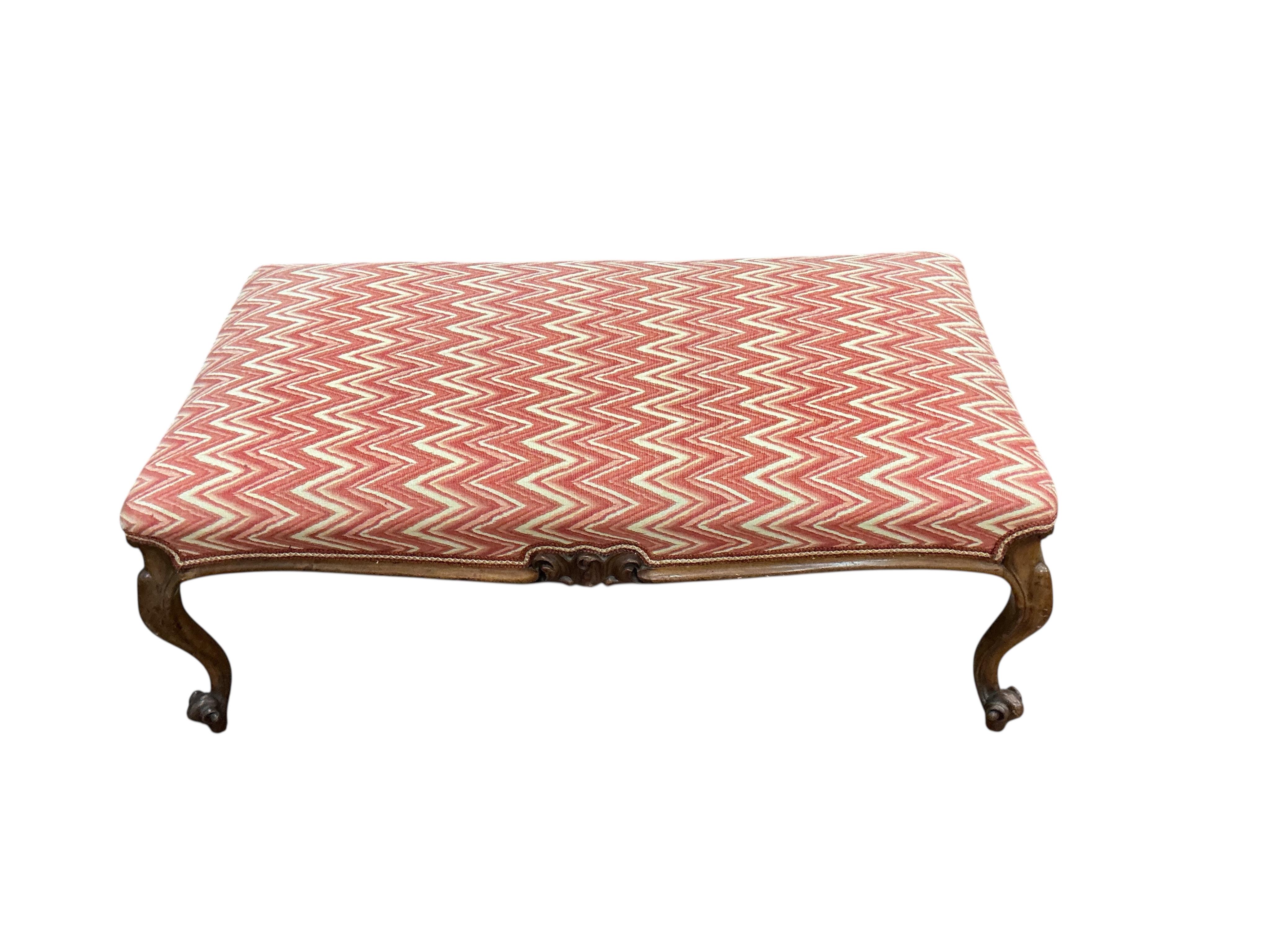 A Victorian walnut dressing stool, width 106cm, depth 55cm, height 40cm